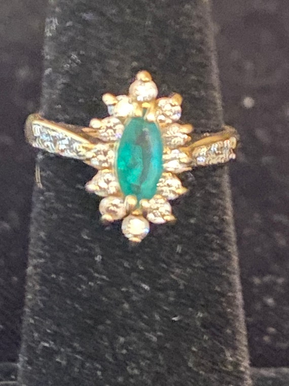 Marquis cut emerald and diamond 14 K ring