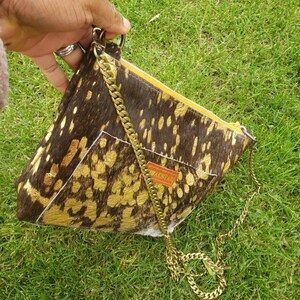 Crossbody bag for woman, messenger bag, leather bag, Cowhide acid wash, shoulder bag, with ankara lining.