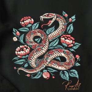May include: Embroidered design of a snake coiled among flowers and leaves. The snake features a pattern of red, white, and tan scales. The flowers are pink and red, with teal leaves. The design is on a black background. The text "Rious Art EMBROIDERY" is at the bottom.
