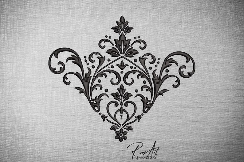 May include: Black embroidered damask design with floral and scroll elements. The design features a symmetrical pattern with a central floral motif and a signature at the bottom. The background is a textured, light gray fabric.