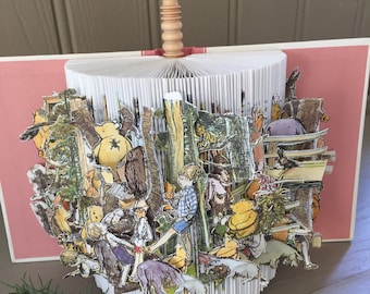Stories from 'Winnie the Pooh' brought to life. A unique book sculpture for young and old