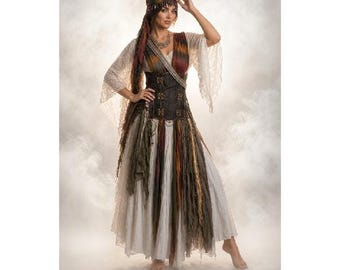 May include: A multi-layered costume featuring a white lace dress with wide sleeves, a dark brown structured corset with lace-up details, and a long, tattered-style overskirt in shades of brown, olive, and rust, paired with a matching headscarf.