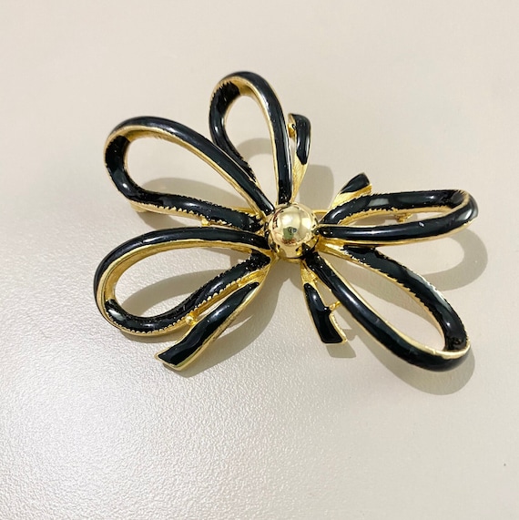 Black Enamel and Gold Brooch