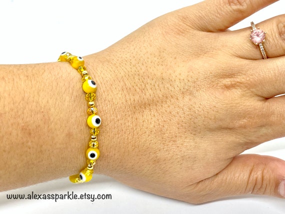 Gold mal de ojo bracelet sale
