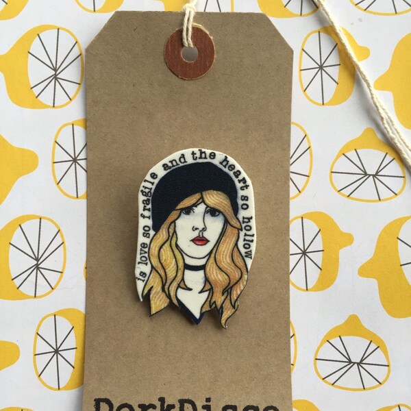 Stevie Nicks badge in shrink plastic.