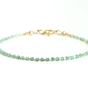 Dainty Emerald Bracelet, Faceted Cube Gemstone, Gold Accents
