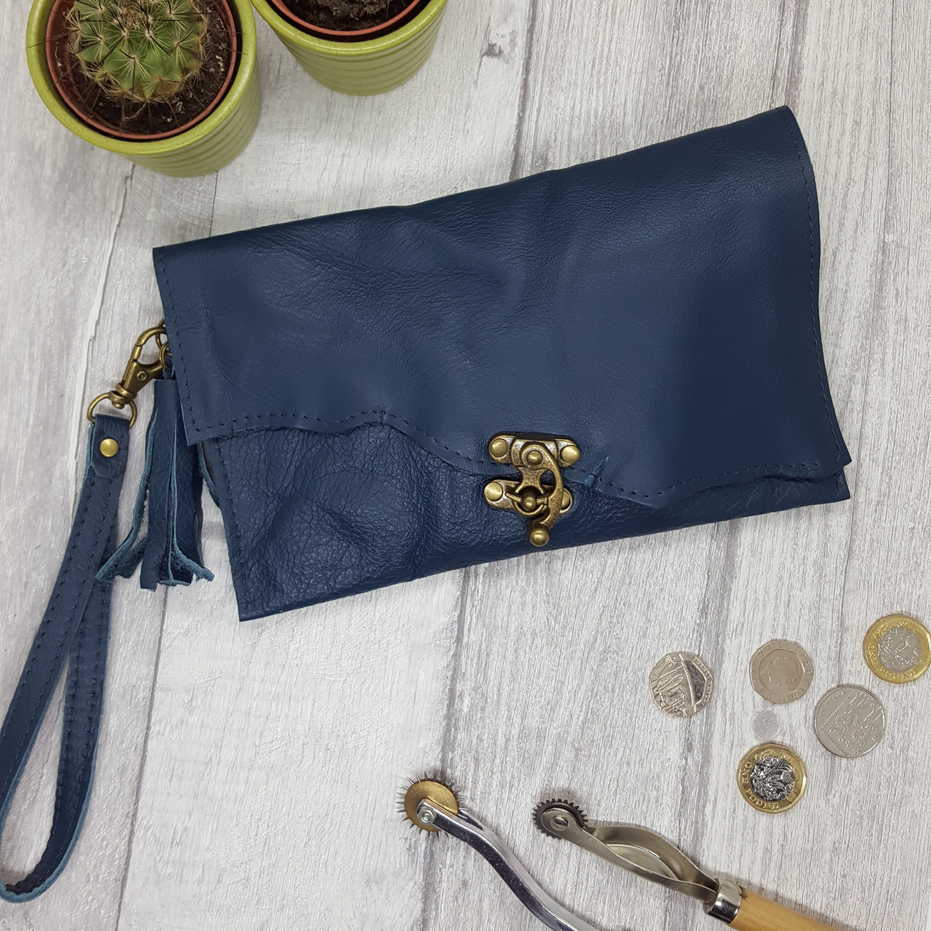 navy leather clutch bag