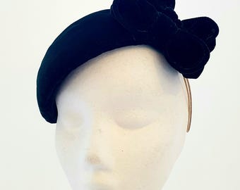 Beautiful handmade silk velvet sculpture shaped headband with double bow trim.