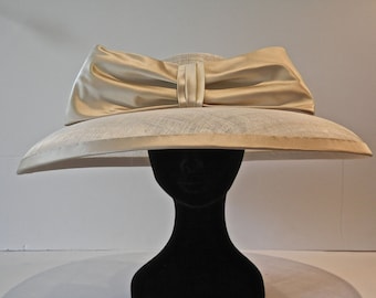 Classic Audrey Hepburn large brim hat with silk satin bow and edge.  Perfect wedding mother of the bride / groom hat or hat for the races.