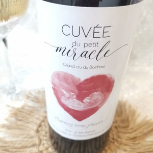 Pregnancy announcement. Wine bottle label "Cuvée du petit Miracle"