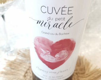 Pregnancy announcement. Wine bottle label "Cuvée du petit Miracle"