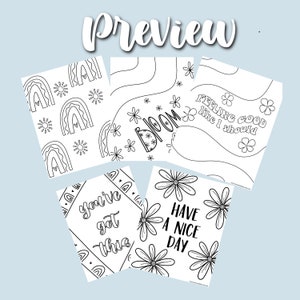 May include: A collection of black and white coloring pages with inspirational quotes and floral designs. The pages feature phrases like "Bloom," "Feeling good like I should," "You've got this," and "Have a nice day," along with rainbows and flowers.