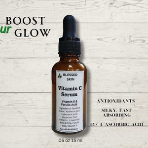 May include: A brown glass bottle of Vitamin C Serum with a black dropper. The label reads "Blessed Skin Vitamin C Serum" with ingredients listed. Text above says "Boost your Glow". The bottle contains .05 oz / 15 ml.
