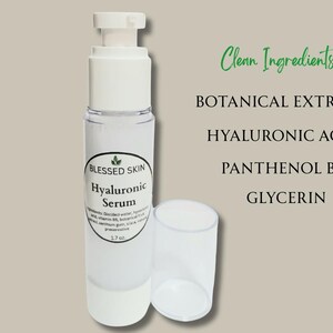 May include: A clear 1.7 oz. bottle of Blessed Skin Hyaluronic Serum with a white pump dispenser and a separate clear cap. The label lists ingredients including botanical extracts, hyaluronic acid, panthenol B5, and glycerin as clean ingredients.