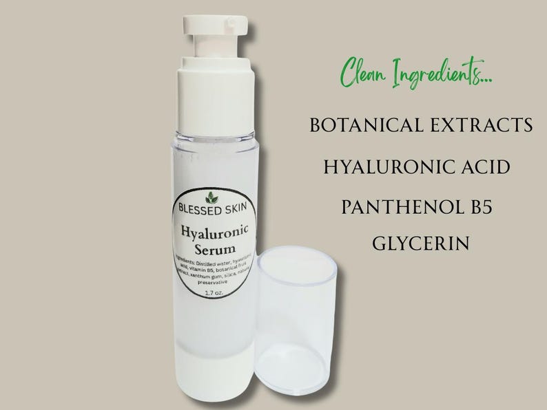 May include: A clear 1.7 oz. bottle of Blessed Skin Hyaluronic Serum with a white pump dispenser and a separate clear cap. The label lists ingredients including botanical extracts, hyaluronic acid, panthenol B5, and glycerin as clean ingredients.