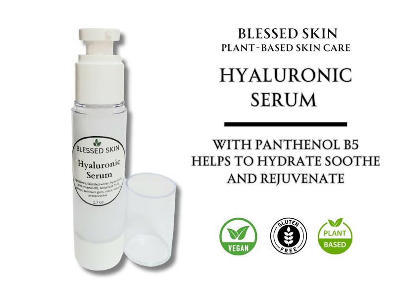 May include: A clear plastic pump bottle of Blessed Skin Hyaluronic Serum with a white cap. The label lists ingredients and 1.7 oz volume. Text reads: Blessed Skin Plant-Based Skin Care, Hyaluronic Serum, with Panthenol B5, helps to hydrate, soothe and rejuvenate. Includes Vegan, Gluten Free, and Plant Based icons.