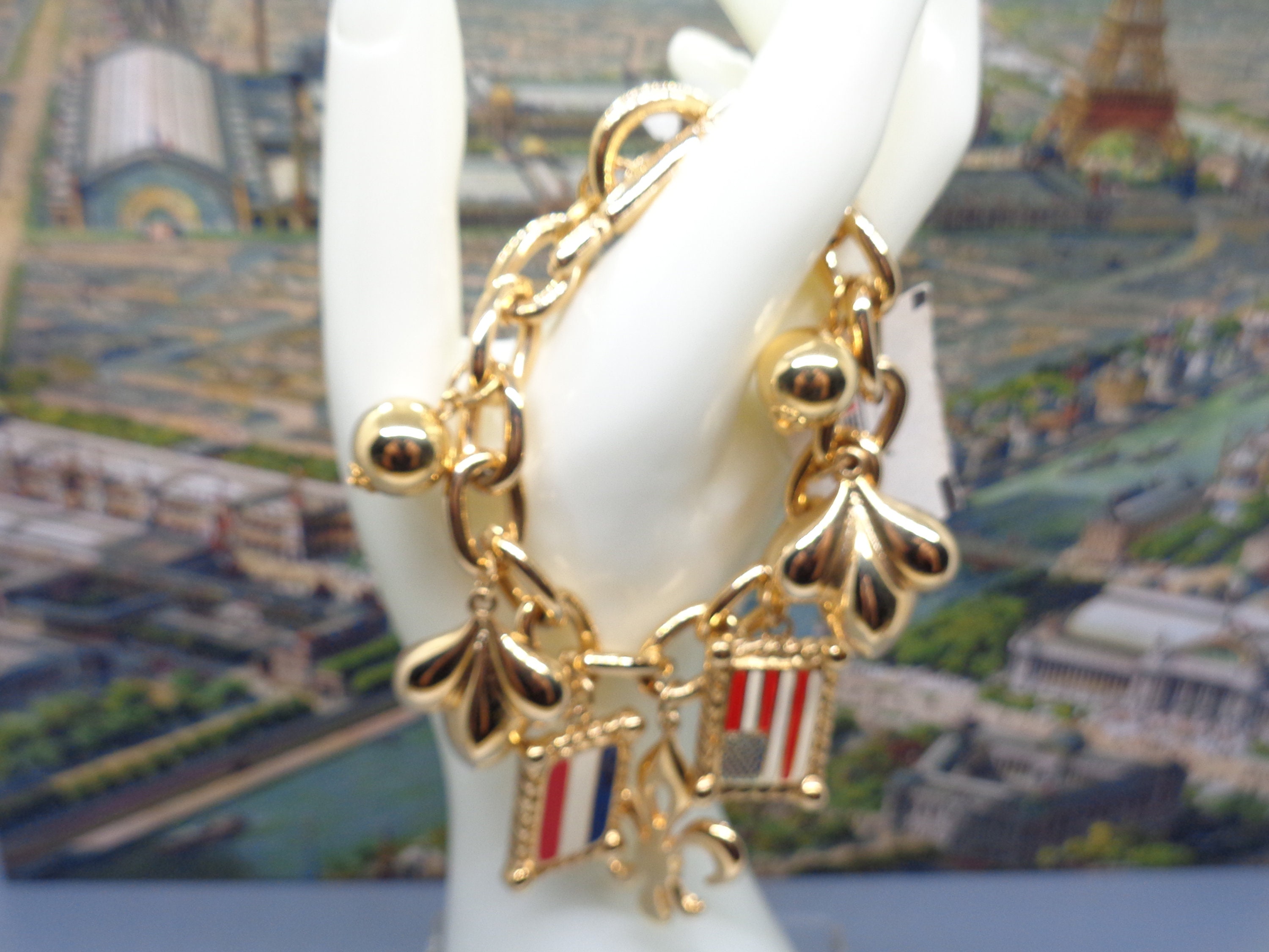 Vintage RODIER PARIS Centennial Charm Bracelet Gold Charms 