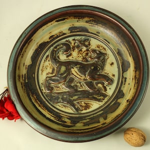 Knud Kyhn, Royal Copenhagen, Denmark. Plate with  Panther
