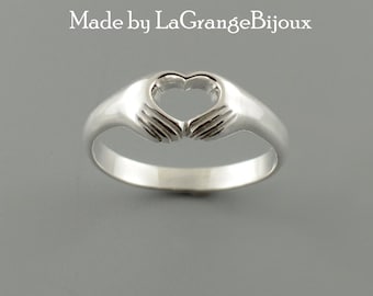 Heart in hands ring  symbol of love and friendship made in 925 sterling silver