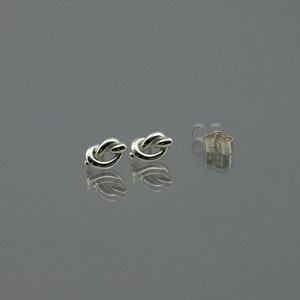 Small lovers knot stud or pole earrings hand-made in solid 925 sterling silver