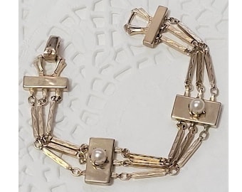 Vintage goldfarbenes Gliederarmband mit Perlenakzenten