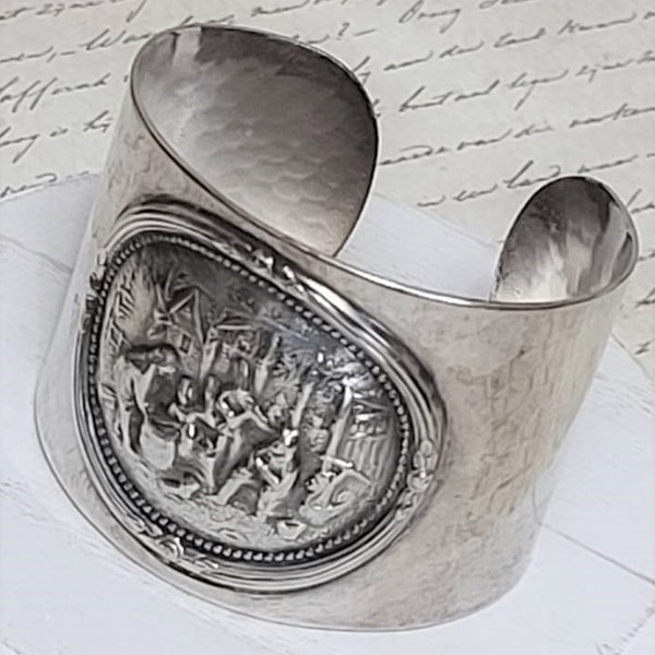 Vintage West German Cuff Bracelet with Raised figural theme 2 1/2" wide cuff fits smaller wrist