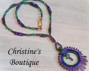 Handcrafted Artisan Necklace, Circle Pendant with Green Jade Accents, Purple Glass Beaded Necklace, Circle Lariat Necklace, Miyuki Delicas