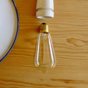 Lâmpada de filamento LED E27: 60W em formato de pera