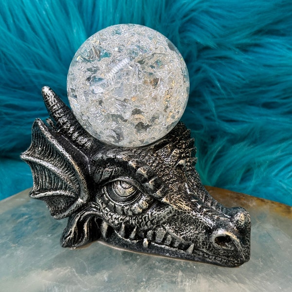 Dragon head resin sphere holder with a glass sphere included TP43
