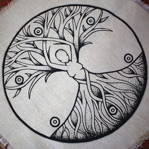 May include: A black and white illustration of a tree of life with intricate branches and roots. The tree is surrounded by a circle and has several small circles within the branches and roots.