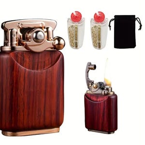 May include: Two wooden lighters with a red finish. One lighter is a traditional design with a wick and a flame. The other lighter is a refillable design with a built-in flint and a metal top.
