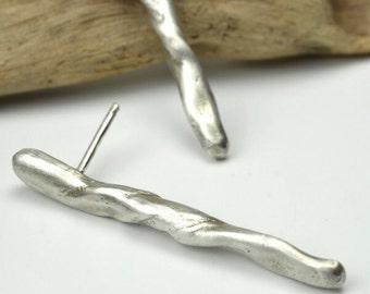 Handmade silver earrings with natural and irregular shapes