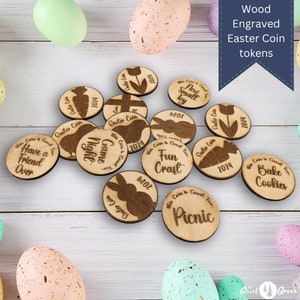 May include: A set of 12 wooden Easter coin tokens with various designs and sayings. The tokens are engraved with phrases like "Have a Friend Over", "Fun Craft", "Bake Cookies", and "New Small Toy".