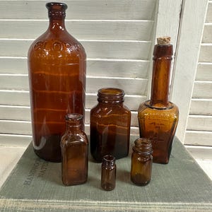 Vintage BOTTLES Group of 6 AMBER Brown Bottles