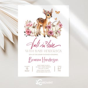 May include: Baby shower invitation featuring a watercolor illustration of a fawn with a floral crown, pumpkins, and pink flowers. The text reads "Fall in love with Baby Henderson" and includes event details.