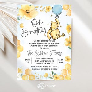 May include: A baby shower invitation with a watercolor design. The invitation features a yellow Winnie the Pooh character holding a blue balloon. The text reads "Oh Brother" and includes event details for a baby sprinkle.