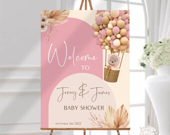 Puede incluir: Bienvenido a la fiesta de bienvenida al bebé de Jenny & James con un esquema de color rosa y beige. El cartel presenta un globo aerostático con un osito de peluche y un diseño floral.