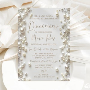May include: A white invitation card with a pearl design. The text reads "MR. & MRS. GARCIA INVITE YOU TO CELEBRATE THE Quinceañera of their daughter Maria Rose SATURDAY, AUGUST 12TH Two O'clock in the afternoon ST. JOHN'S CHURCH 3010 CAMBRIDGE STREET BOSTON, MA 09876 Reception to follow at 4:00pm 9876 HIGH STREET BOSTON, MA 09876 RSVP TO JANICE 876.901.4400 BY 8/02"