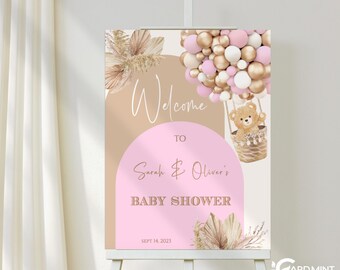 Puede incluir: Bienvenido a la fiesta de bienvenida al bebé de Sarah y Oliver, con una combinación de colores rosa y marrón. El cartel presenta un globo aerostático con un osito de peluche y un diseño floral.