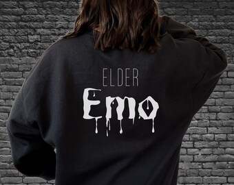 May include: Black sweatshirt with white text that reads "ELDER Emo" with dripping letters.
