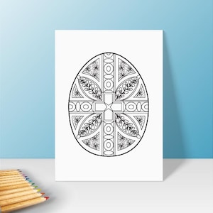 May include: A black and white printable coloring page featuring an intricate design of an Easter egg with a cross in the center.