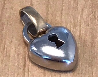Cute heart with keyhole pendant or charm  10 k white and yellowgold