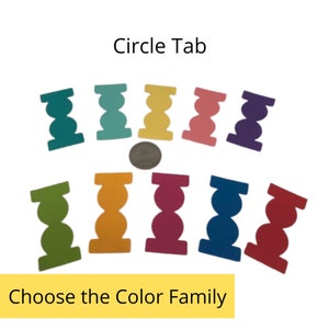 May include: Assortment of colorful circle tabs in teal, aqua, yellow, pink, purple, green, orange, magenta, blue, and red.  Circle Tab. Choose the Color Family.