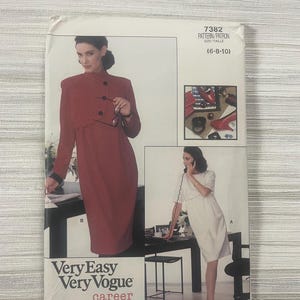 May include: A vintage sewing pattern titled "Very Easy Very Vogue Career." The pattern features illustrations of women's career wear, including a red dress and a white dress. The pattern size is (6-8-10).