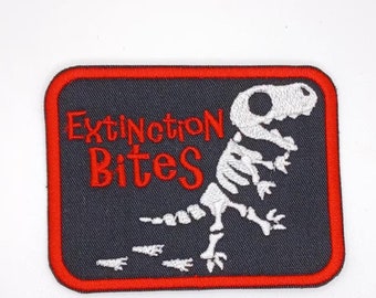 May include: Red and black embroidered patch with a white dinosaur skeleton and the text "Extinction Bites".