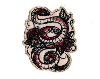 Broderad ormstryklapp: Gotisk reptiltygvapen