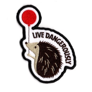 Live Dangerously Hedgehog Patch | Hand-Finished Embroidered Iron-On Fabric Patch | Cute & Whimsical by BalkisBoutique