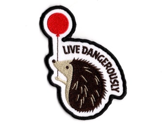 Live Dangerously Hedgehog Patch – Hand-Finished Embroidered Iron-On Fabric Badge by BalkisBoutique