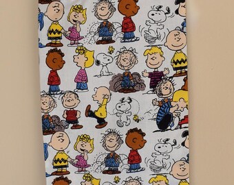 224# Charlie Brown and Family Plastic Grocery Bag Holder
