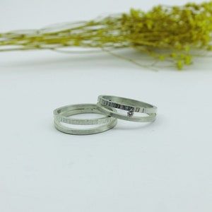 ホワイトゴールドとダイヤモンドの結婚指輪、ホワイトゴールドの結婚指輪、ダイヤモンドの結婚指輪、オリジナルの結婚指輪、ミニマリストの結婚指輪。